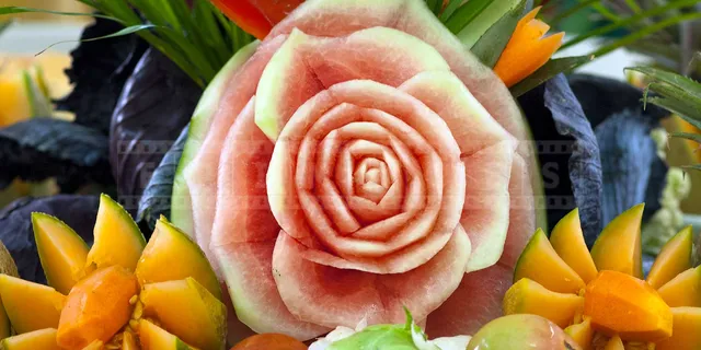 Melon and watermelon carvings make unqiue table centerpiece