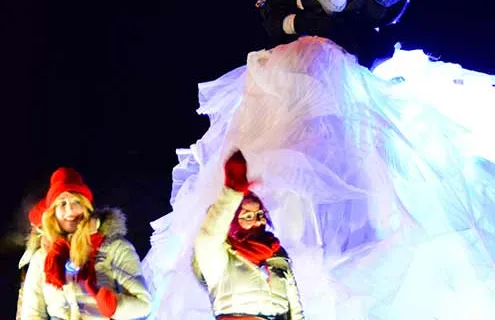 Queen of night parade greeting people
