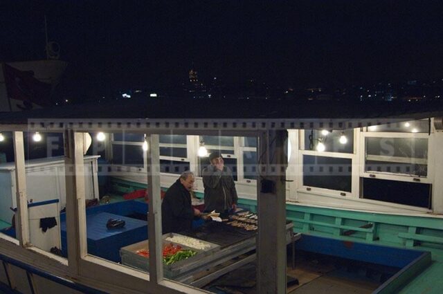 Istanbul waterfront boat grill street food vendor fresh mackerel sandwiches