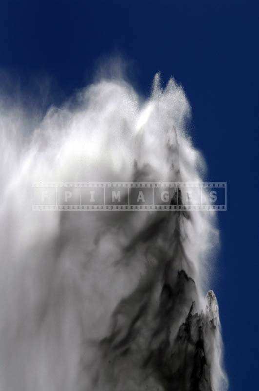 The White Mist of Water against the Blue Sky