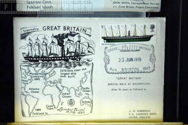 Royal mail stamp and map of voyages on the postcard