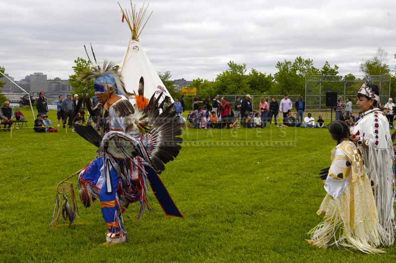 Fancy dance and traditional wigwam
