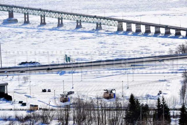 Two cable cars, 440 highway and bridge to Orleans island