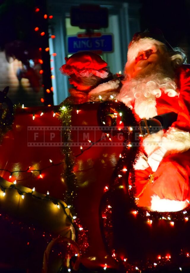 Santa and his sleigh at the night xmas parade