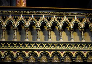 Blue and golden decorations with red accents