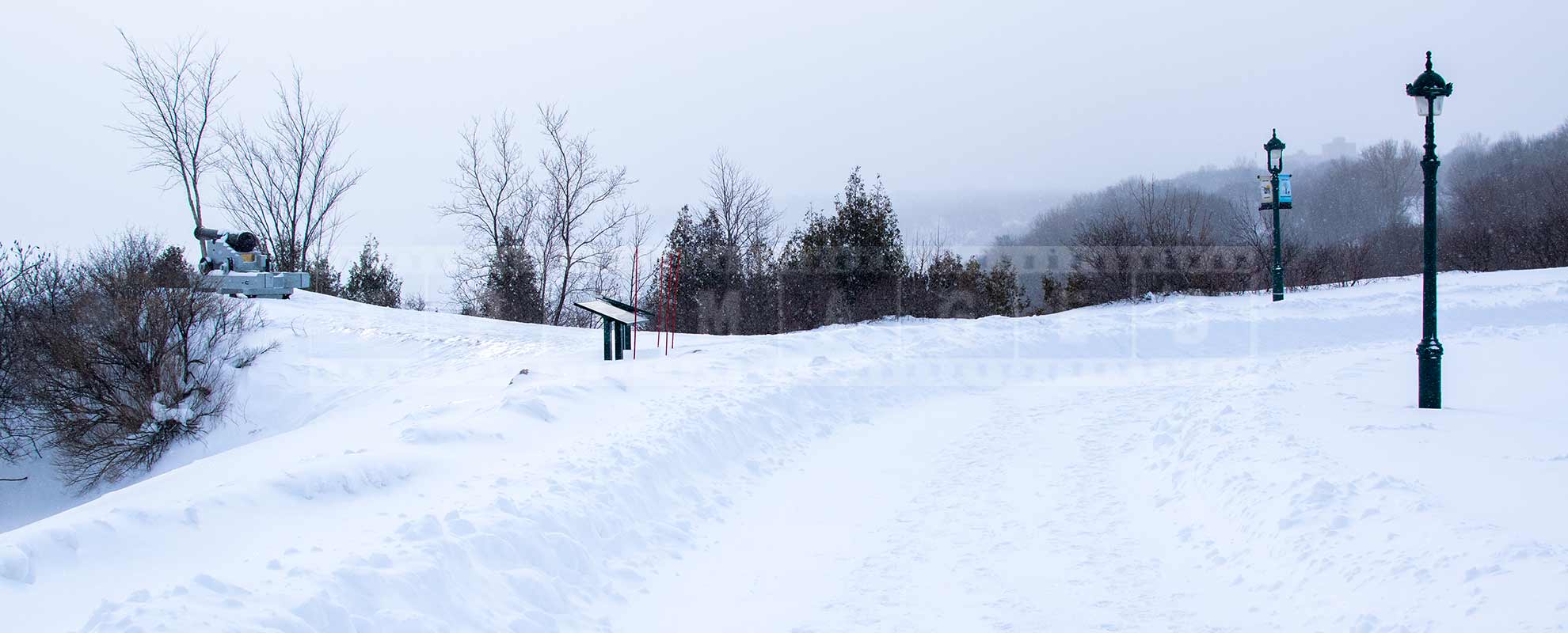 winter trail in plains of abraham park in quebec city