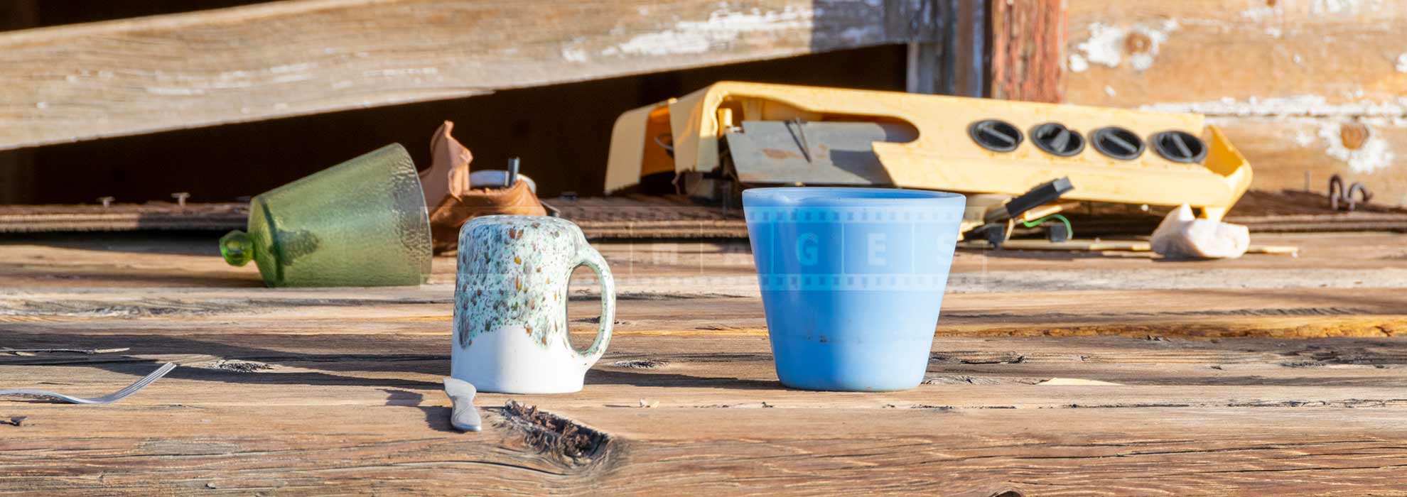Details of a table with knife, fork and cups, meal that stretched forever
