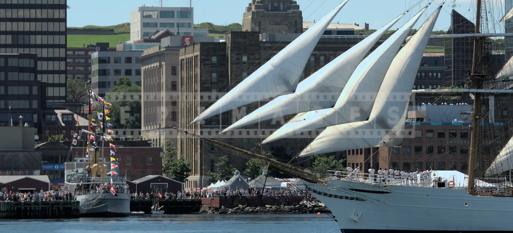 tall ship sailing by Halifax waterfront