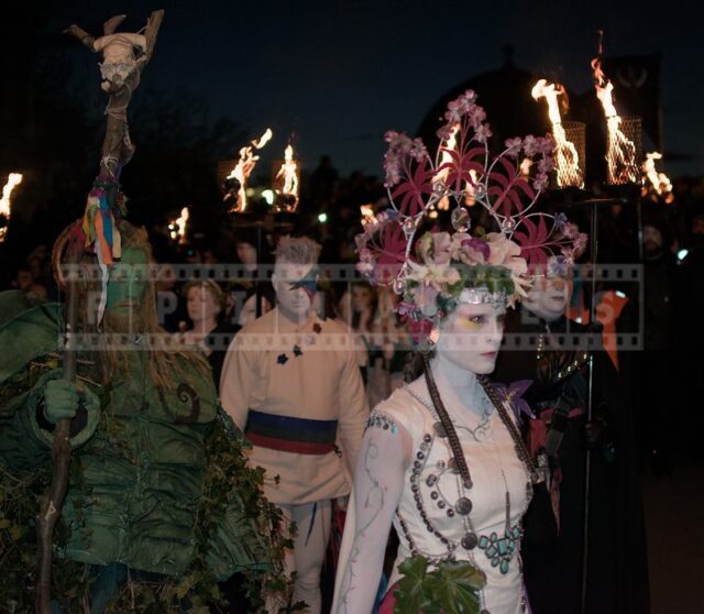 Green man follows May Queen at Beltane Fire Festival