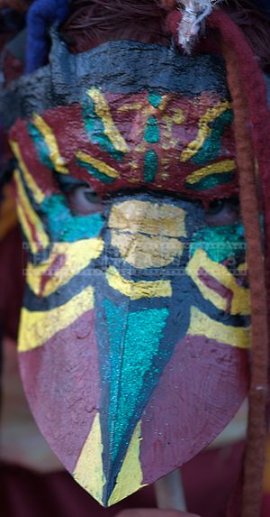 Beltane fire show - artist in a mask