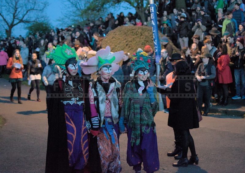 Beltane Fire Fest Three performers in flower costumes posing for a picture