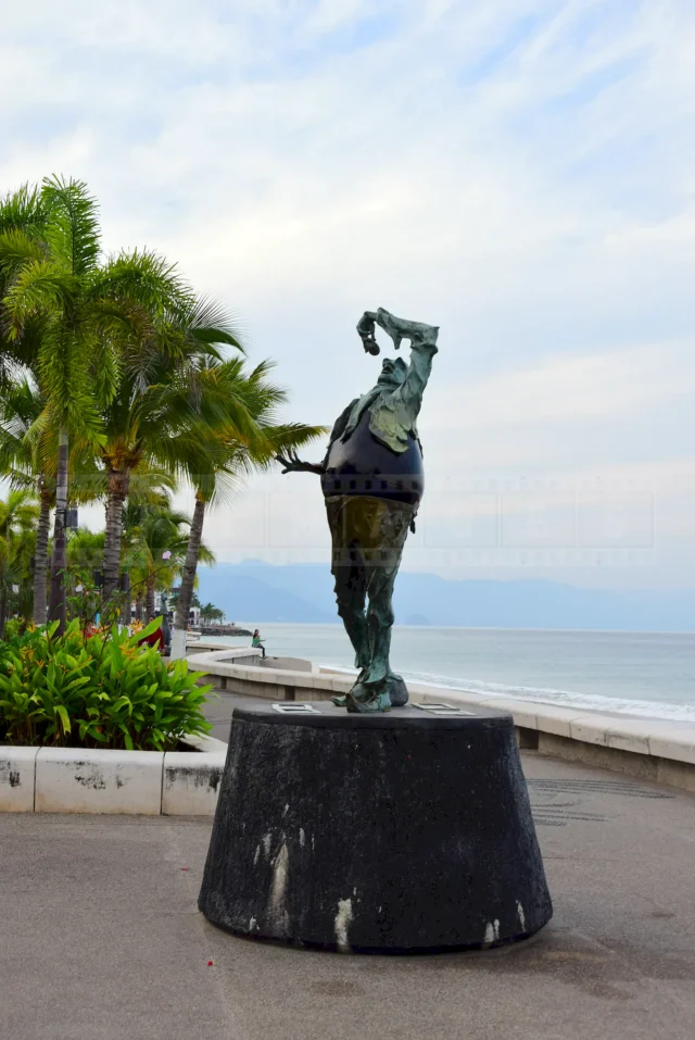 Eggplant like humanoid is swallowing and eggplant.